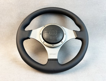 Front view of Evo 9 steering wheel with OEM airbag