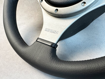 Perforated grip detail on MOMO leather steering wheel