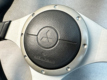 Mitsubishi logo airbag center on Evo 8 steering wheel