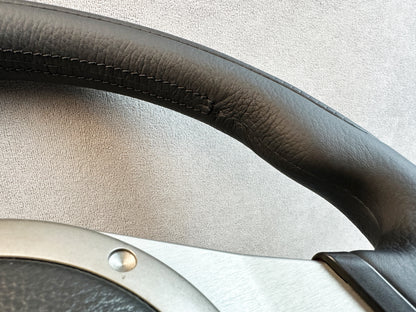 Top stitching and MOMO logo embossing on Evo steering wheel