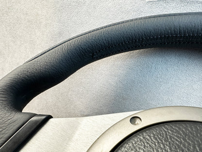 Side angle showing ergonomic grip of Evo 7 wheel