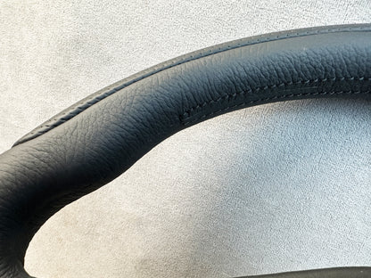 Side view of ergonomic grip on refurbished Evo 7 wheel