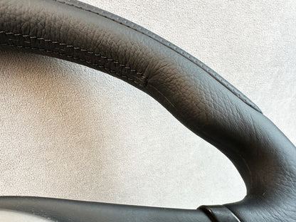 Evo 9 MOMO wheel with new stitched leather and restored grip