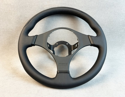Side view of ergonomic grip on refurbished Evo 7 wheel