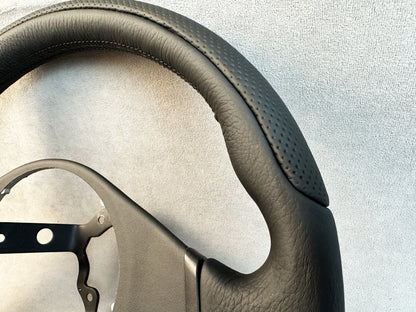 MOMO logo and leather finish on Evolution 7 8 9 steering wheel