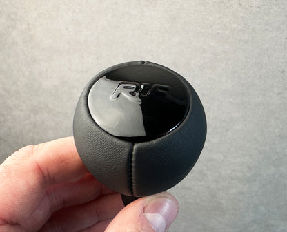 Side view of RUF shift knob with gloss finish