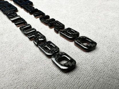 AMG Biturbo carbon side emblems with metallic lettering