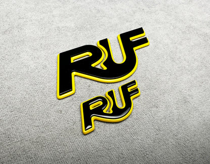 Stylish yellow with black RUF emblems for Porsche 911 models – high-performance look